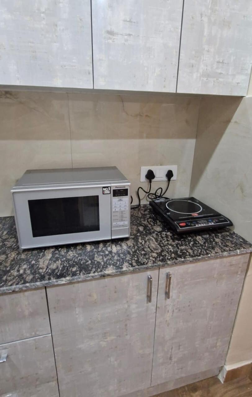 Appartement Cozy Retreat Fully Furnished à Greater Noida Extérieur photo